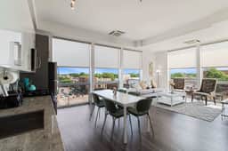 2BR City Loft Sweeping Glass Views - Image 2