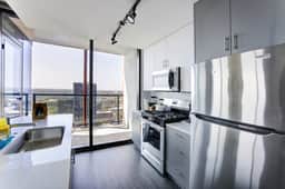 2BR Designer Suite in City Center w/ Skyline Views - Image 5