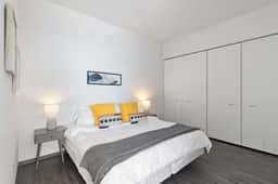 1BR City Loft With Modern Glass Views - Image 3