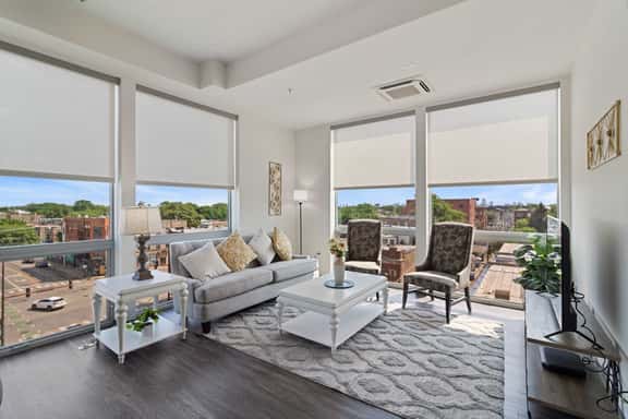 2BR City Loft Sweeping Glass Views - Image 1