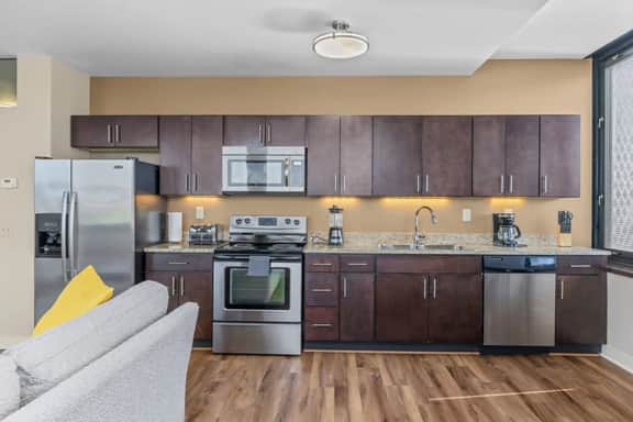 2BR Downtown Apartment with Gym & Deck - Image 2